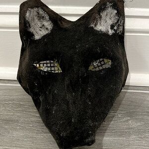 Black wolf mask 6 inches tall and 7 1/2 inches long.
